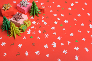 Christmas or New Year background, plain composition made of Xmas decorations and fir branches, flat lay, blank space for a greeting text