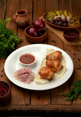 fried chicken on lavash with onion and ketchup