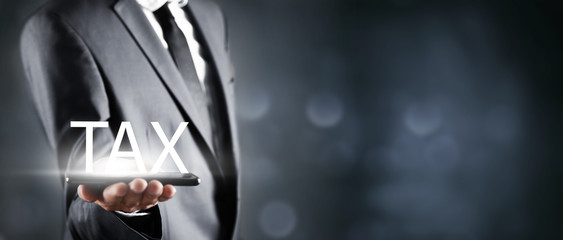businessman and icon with tax text