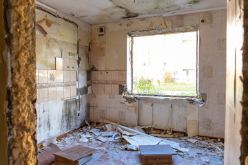 interior of an uninhabited abandoned ruined apartment