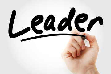 Hand writing Leader with marker, business concept background