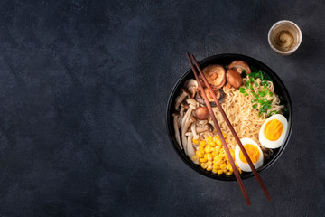 Ramen. Soba noodles with an egg, shiitake and enoki mushrooms, corn and scallions, shot from above...