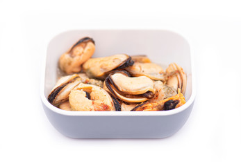 Plate or Bowl with Mussels in Oil, Mussels marinated with Oil isolated on white Background