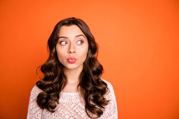Portrait of funny funky pretty girl look copy space watch boyfriends want send air kiss on holidays...