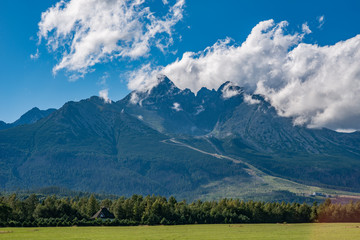 high tatra mountains view with lomnicky stit in clouds