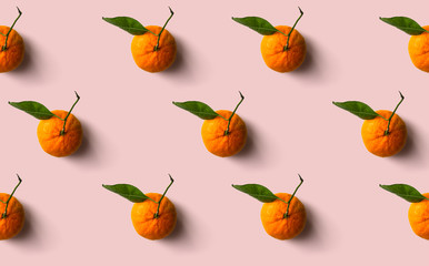 Mandarin pattern isolated on pink background. Fresh fruit.