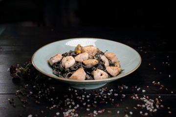 Black pasta and seafood mussel shrimp