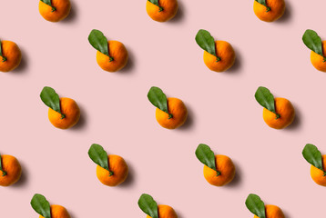 Mandarin pattern isolated on pink background. Fresh fruit.