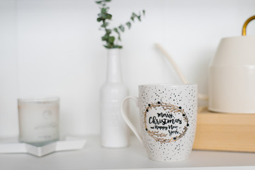 A white mug with the words 