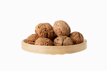 walnut in chinese steamer on white background