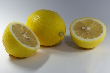 Group of ripe yellow lemon citrus fruit  on white background