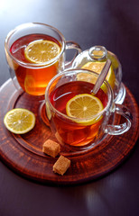Cup of black tea with lemon