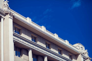 A part of facade of the building and blue sky