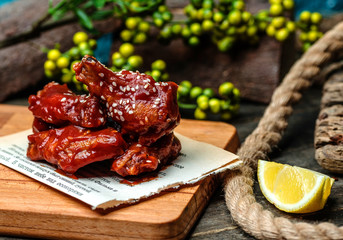 chicken coated in sauce and sesame 1