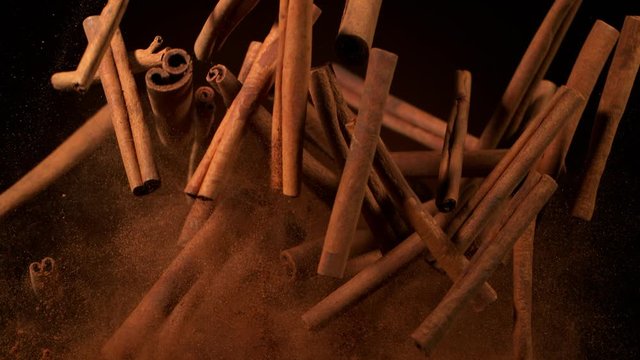 Super slow motion of flying whole cinnamon bark spice. Filmed on high speed camera, 1000 fps
