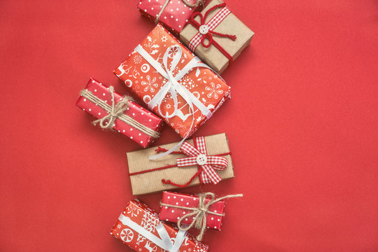 Different gift boxes on red background