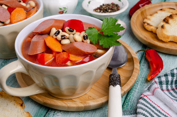 Stewed beans with sausages