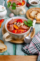 Stewed beans with sausages