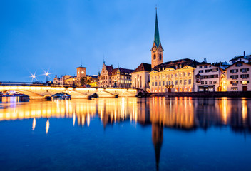 scenic view of historic Zurich city center with famous Fraumunster and Grossmunster Churches and river Limmat at Lake Zurich, Canton of Zurich, Switzerland