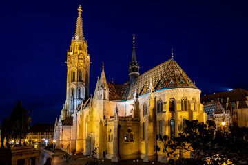 Newly renovated Mathias Church in Budapest is a big attraction for tourists all over the world. Budapest's beauty shown at night through many centuries of architecture, Hungary.