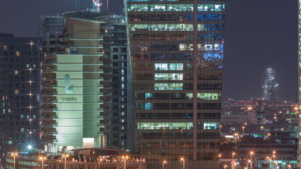 Fototapeta na wymiar Beautiful lights in Dubai with constructing aerial timelapse