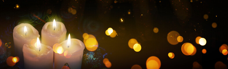 Four burning Advent candles and lights.. Christmas background.