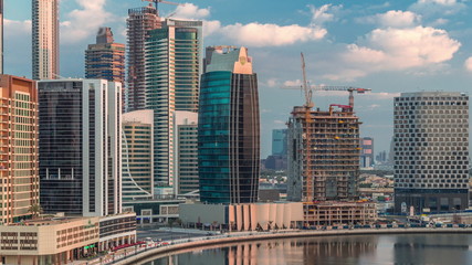 Naklejka premium The rhythm of the city of Dubai from night to morning aerial timelapse