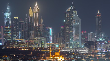 Fototapeta na wymiar The rhythm of the city of Dubai at nightaerial timelapse