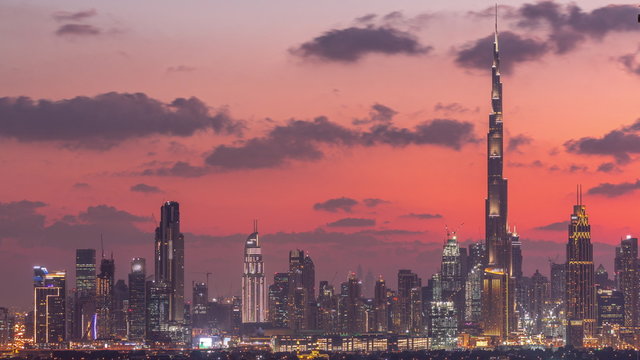 View of modern buildings in luxury Dubai city at sunset aerial timelapse © neiezhmakov
