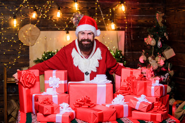 Obraz na płótnie Canvas Man wear Santa costume. Cheerful Santa with gifts. Decorate your christmas with joy. Give big cheer for New Year. Bearded emotional Santa Claus. Christmas just got cheesier. Holidays filled with fun