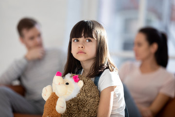 Upset small girl feel lonely suffer from family problems