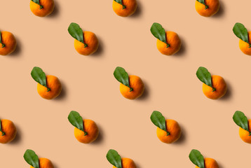 Mandarin pattern isolated on orange background. Fresh fruit.