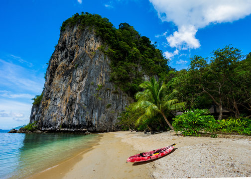 Pink Kayak On A Sandy Beach In El Nido, Palawan, Philippines.  Water Sports And Vacation.