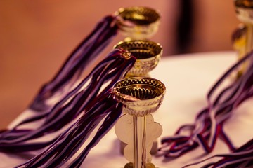 Sports cups and medals for awarding athletes at the championship prizes for winning
