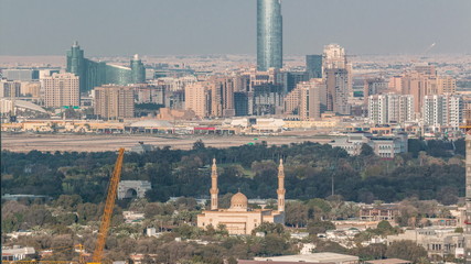 Aerial view to Dubai Creek with festival city timelapse