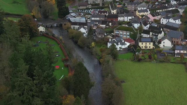 Aerial view of the River Barle and medieval bridge in Dulverton, on the edge of Exmoor national park, UK.
