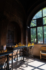 The candle lighting corridor of an old Armenian church