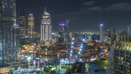 Fototapeta na wymiar Amazing aerial view of Dubai downtown skyscrapers night timelapse, Dubai, United Arab Emirates