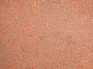 Fototapeta premium Orange facade close-up. Texture. Injection of paint on the house.