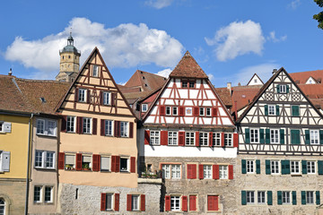 Fototapeta premium Facades of Three Timber Framed Buildings in Sunshine