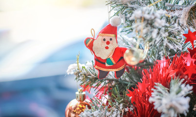 Blurry of Christmas and New Year's balls with beautiful decorations on the Christmas tree, soft light, beautiful background images and illustrations.