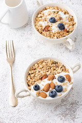 Granola, oatmeal with almond and berry food background