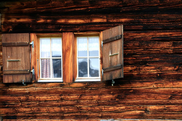 Window of an wooden mountain hut in Swizerland