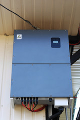 Solar inverter  on the side of a house