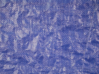 texture blue plastic bag, used dirty canvas, concept recycle plastic
