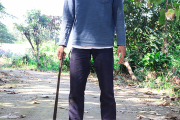 man walking with crutches