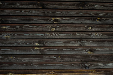 wooden background from old black boards
