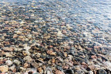 stone under water