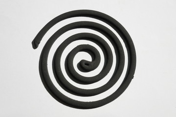 Mosquito repellent incense coil on white background, Mosquito repellent, comma, circle, smoke