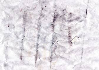 Aged grunge paper texture with newspaper collage and ink.